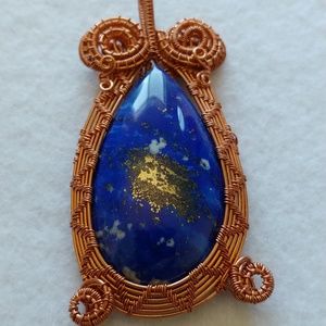 Lapis lazuli hand wire wrapped in stunning copper